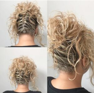 mujer con trenzas y ondas ,peinado moderno